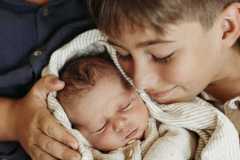 Newborn sessions are a chance to show just how much they are loved by every member of the family. 